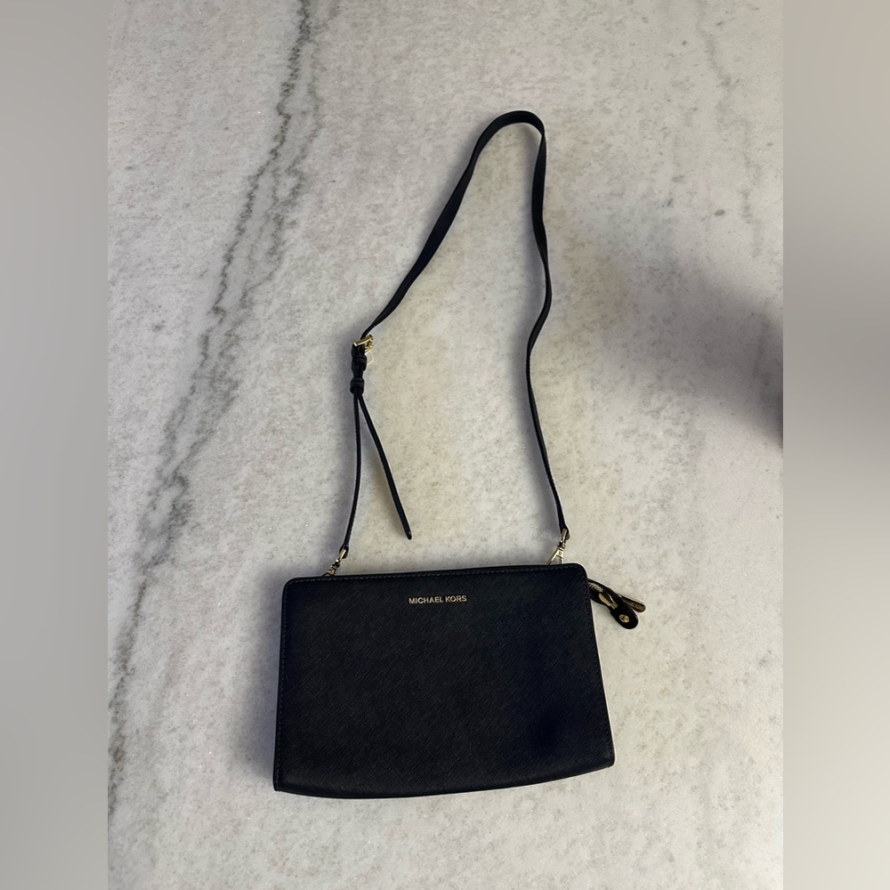 Michael Kors small bag in Saviano leather navy blue! Gently used!